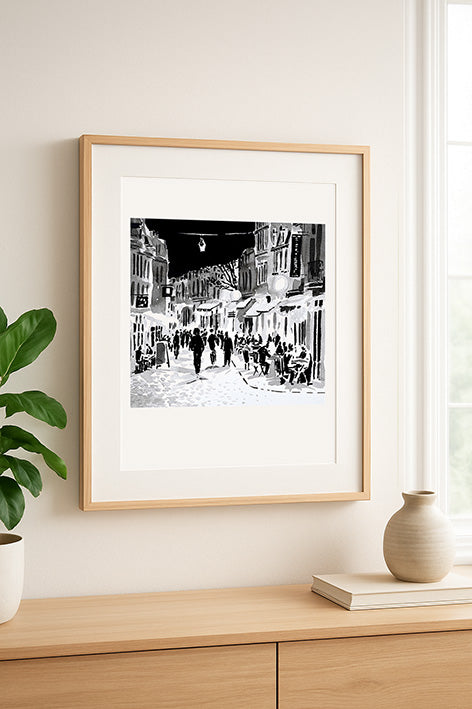Affiche d'Art de la rue de Gand illuminée le soir dans le Vieux-Lille encadrée dans un salon